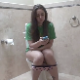 In what appears to be a voyeur video, a girl texts on her cell phone while taking a shit and then wiping herself. No poop action visible, but nice, wet shit sounds and some grunting. About 5.5 minutes.